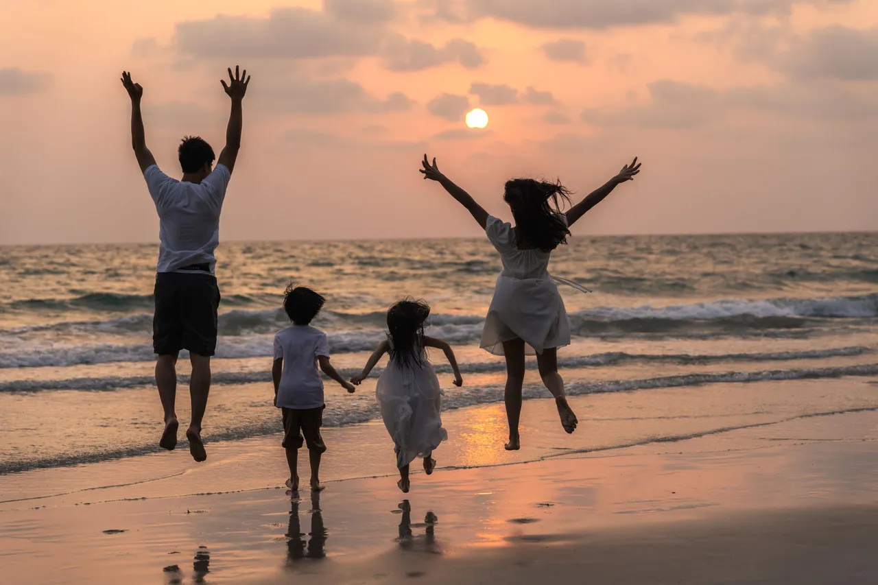 asian-young-happy-family-enjoy-vacation-on-beach-in-evening-dad-mom-and-kid-relax-running-together-near-sea-while-silhouette-sunset-lifestyle-travel-holiday-vacation-summer-concept.jpg