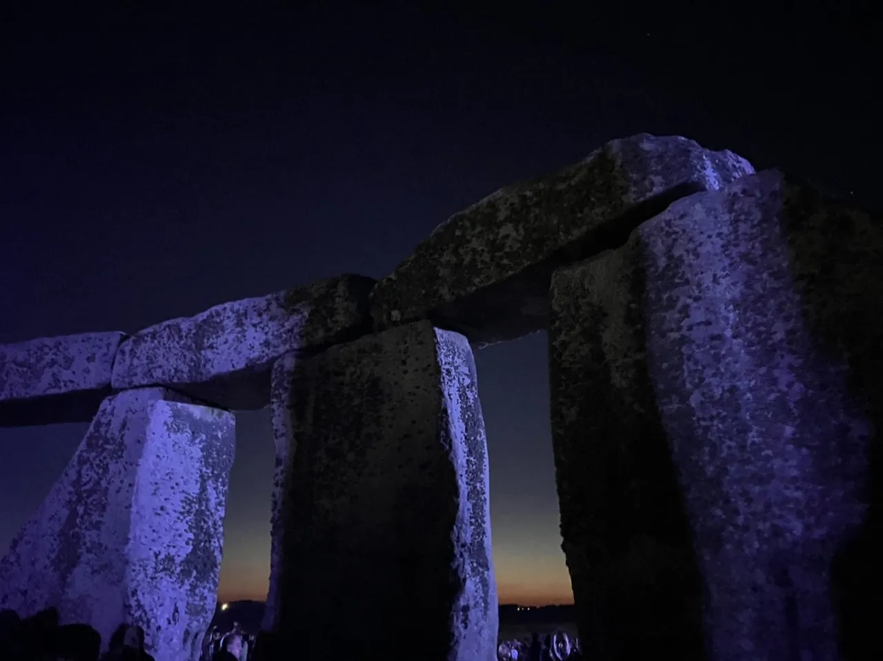 Last colors of the Sunset trough the Holy Stones, Summer Solstice, Stonehenge, UK, 2024