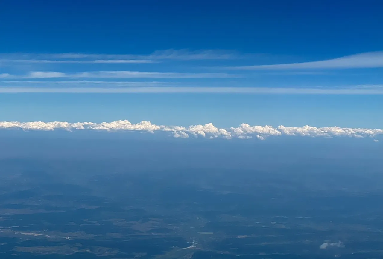 Up in the sky, air, A flight back home, 2024
