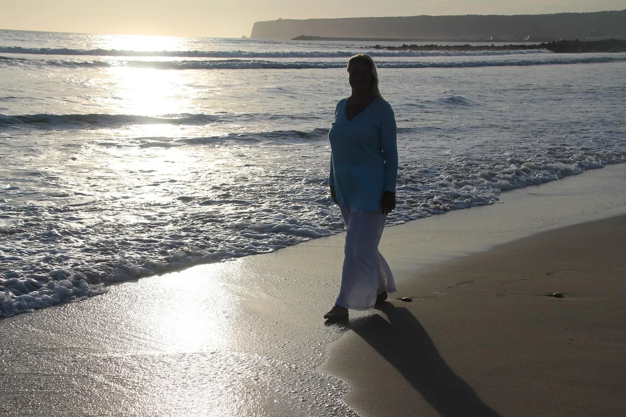 woman-is-walking-on-the-beach-5358327_1920.jpg