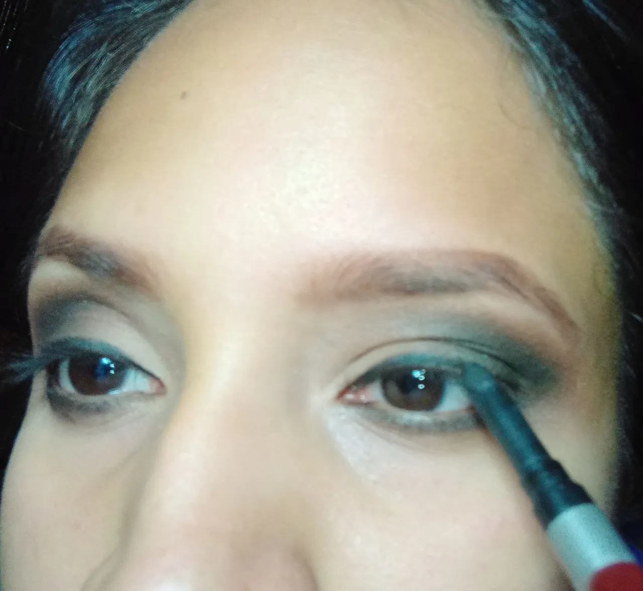 Delinear lagrimal con lapiz negro 12.jpg