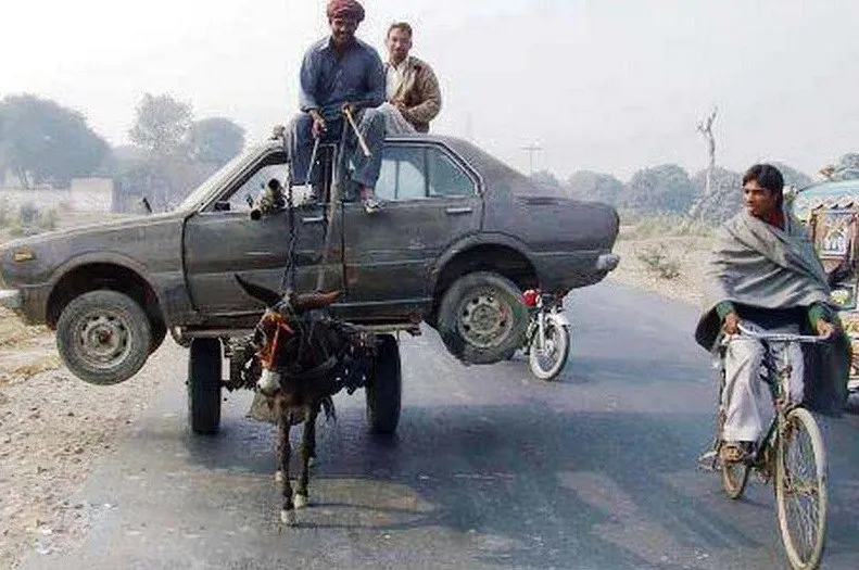 Khota-with-loaded-with-Old-car-Funny-Pictures-2014.jpg