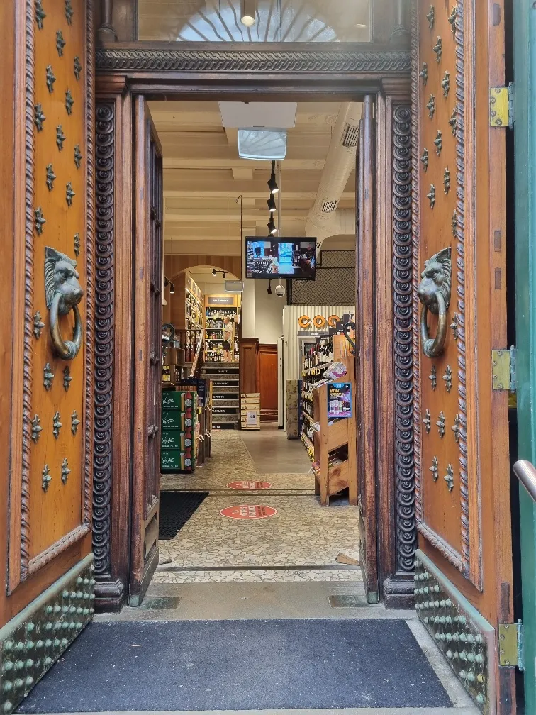 I love the old heavy doors at one of the city centre shops.