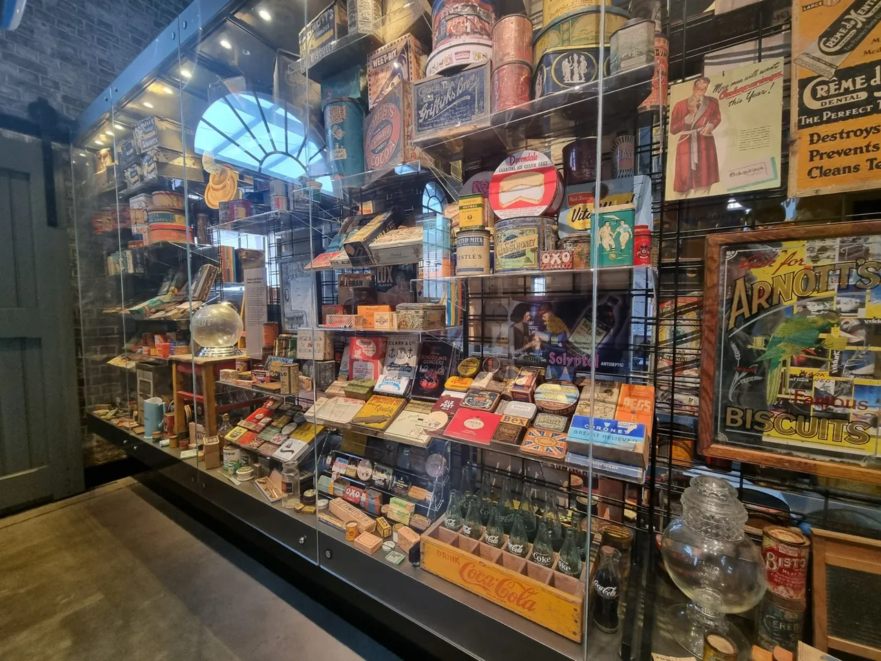 A good selection of old tin, jar and bottles.