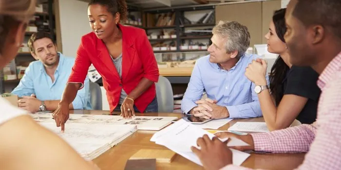 20160120175144-female-boss-leading-meeting-architects-team-working-leadership-colleagues-business.jpeg