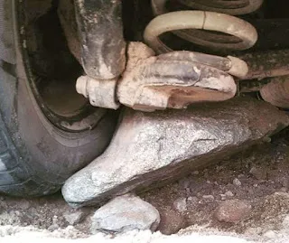 Tire stuck on rock