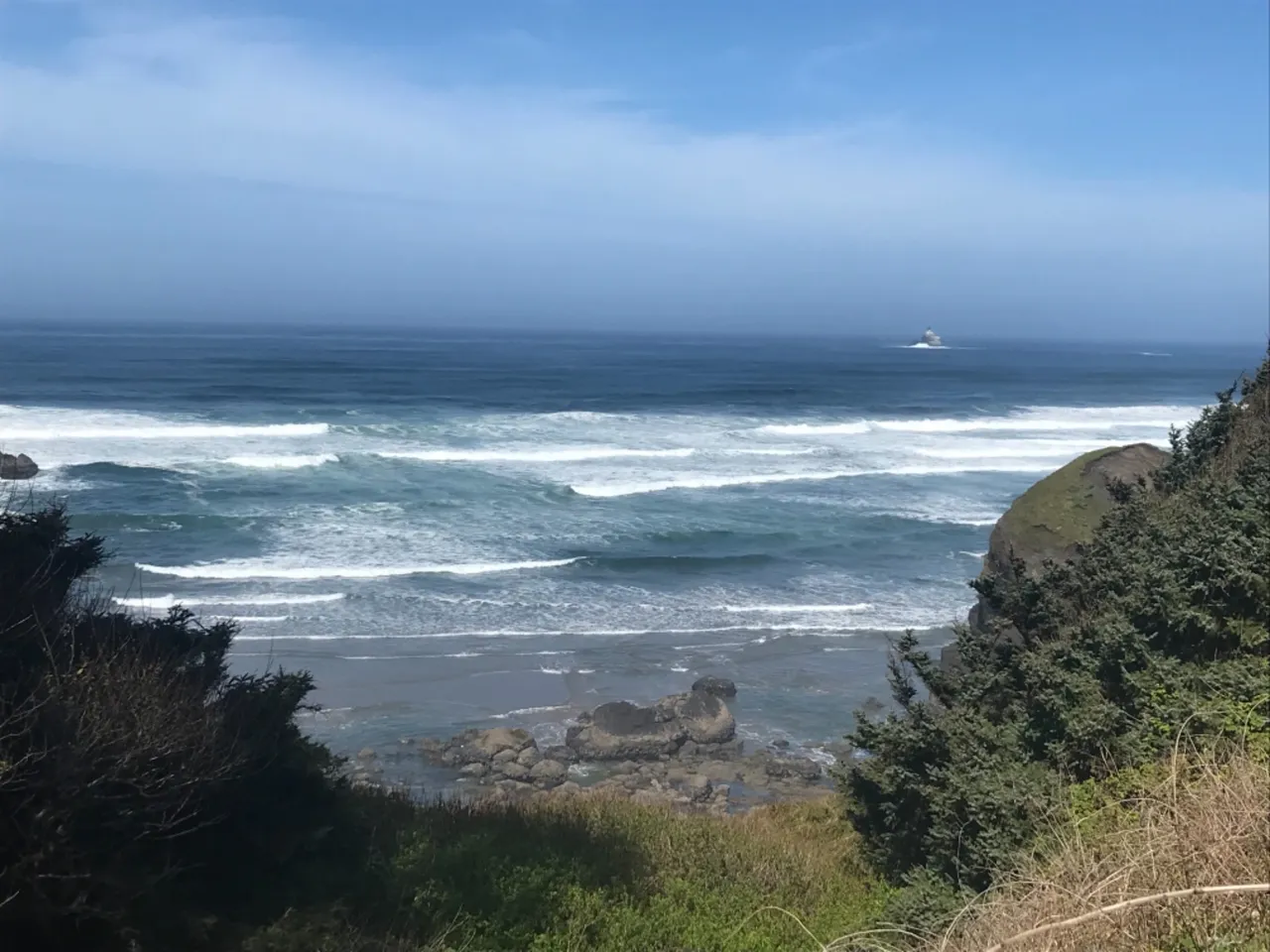 Views over the Pacific towards Tillamook Rock Lighthouse.