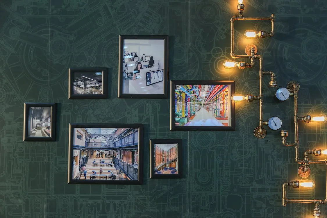 Free Assorted Paintings on Green Wall Stock Photo
