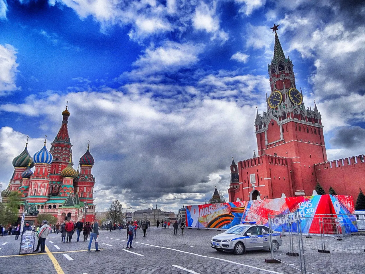 The Cathedral of Vasily the Blessed commonly known as Saint Basil’s Cathedral on the left hand side, Kremlin right.