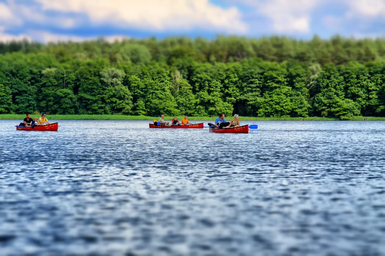On a lake between two parts of the river Drawa