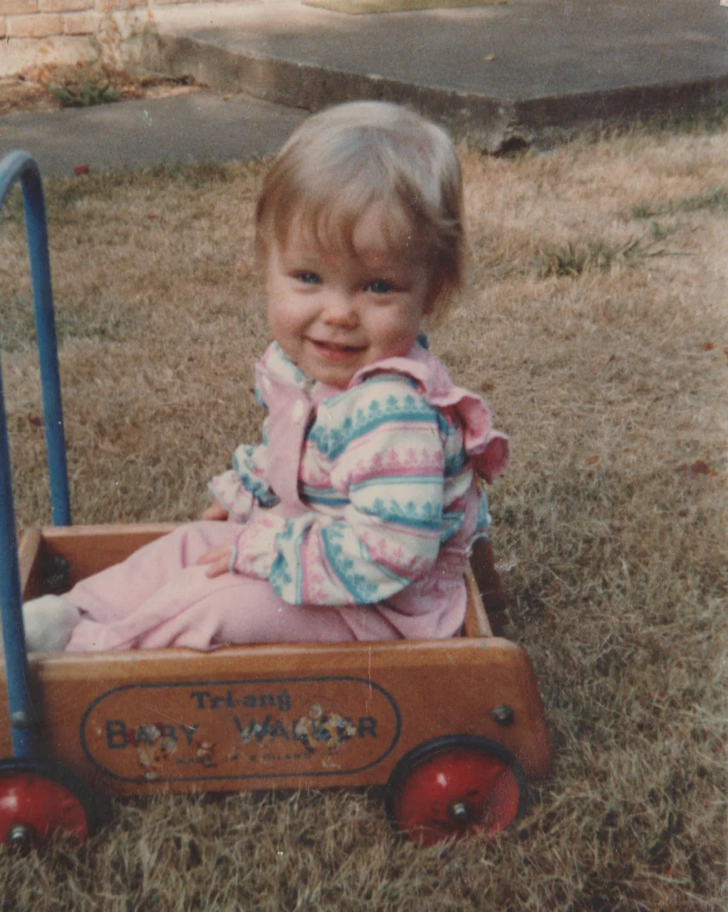 1982 Katie Tri Ang Baby Walker Wagon Pink Overalls apx date.png