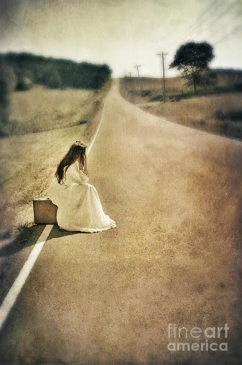 lady-in-gown-sitting-by-road-on-suitcase-jill-battaglia.jpg