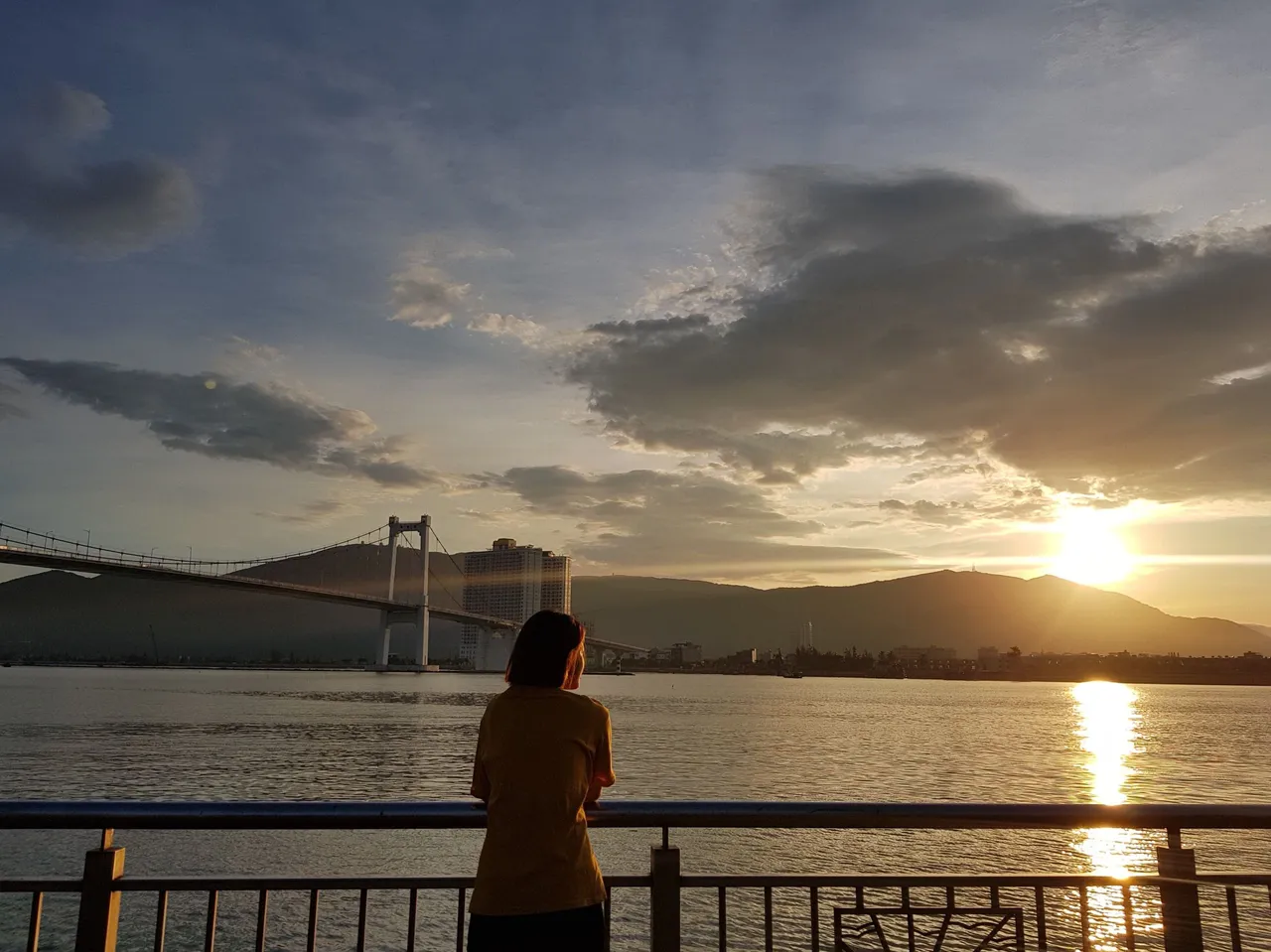 The sunrise at the foot of Thuan Phuoc bridge