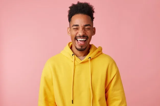 young-happy-smiling-african-american-guy-yellow-hoodie-heard-very-funny-joke-laughed_295783-2454.jpg