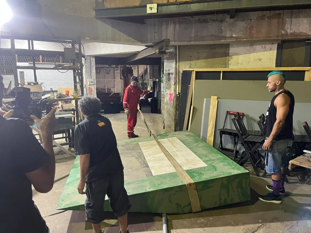 Pharra and his team trying to figure out how this HALF of the sculpture will fit out the loading dock
