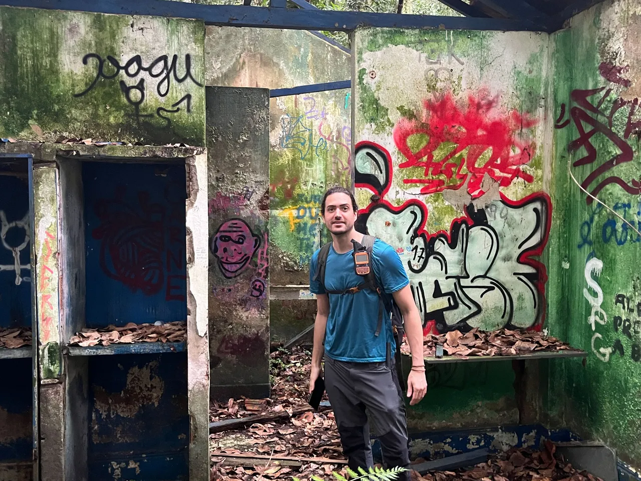@alexandrefeliz looks back at the camera when i take a photo of the abandoned structure