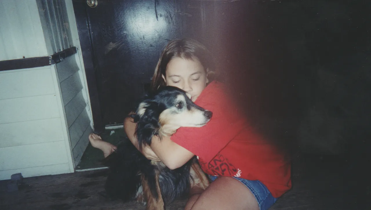 1999 maybe - Raelyn and her dog.jpg
