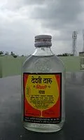 Desi_daru_(desi_liqour)_with_Orange_flavor.jpg