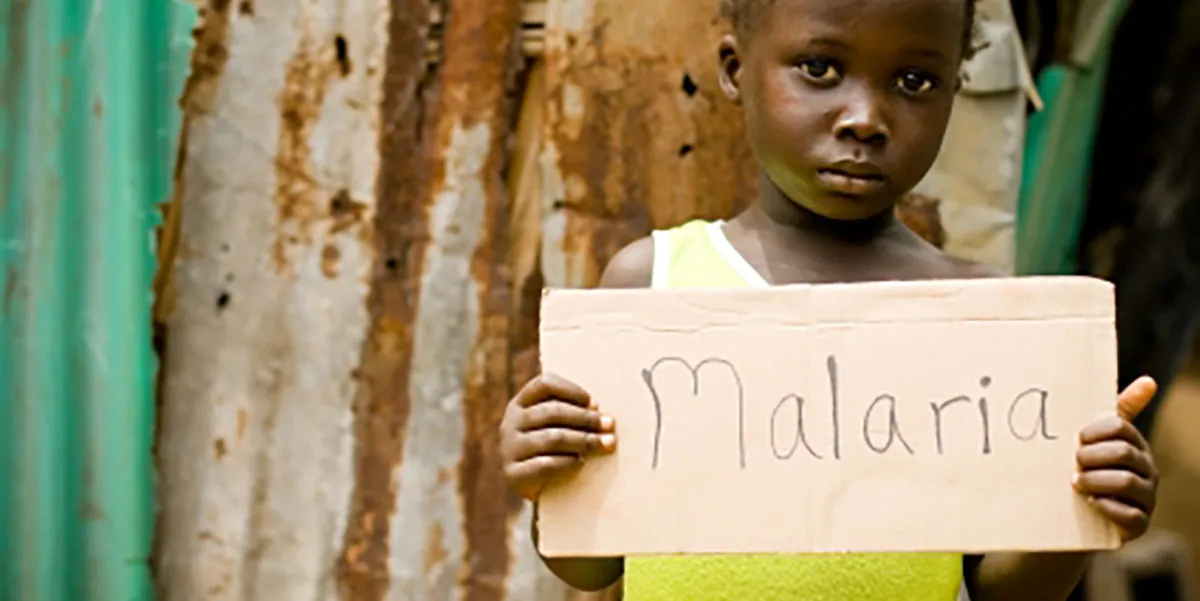 iStock_12754394-child-holding-malaria-sign.jpg