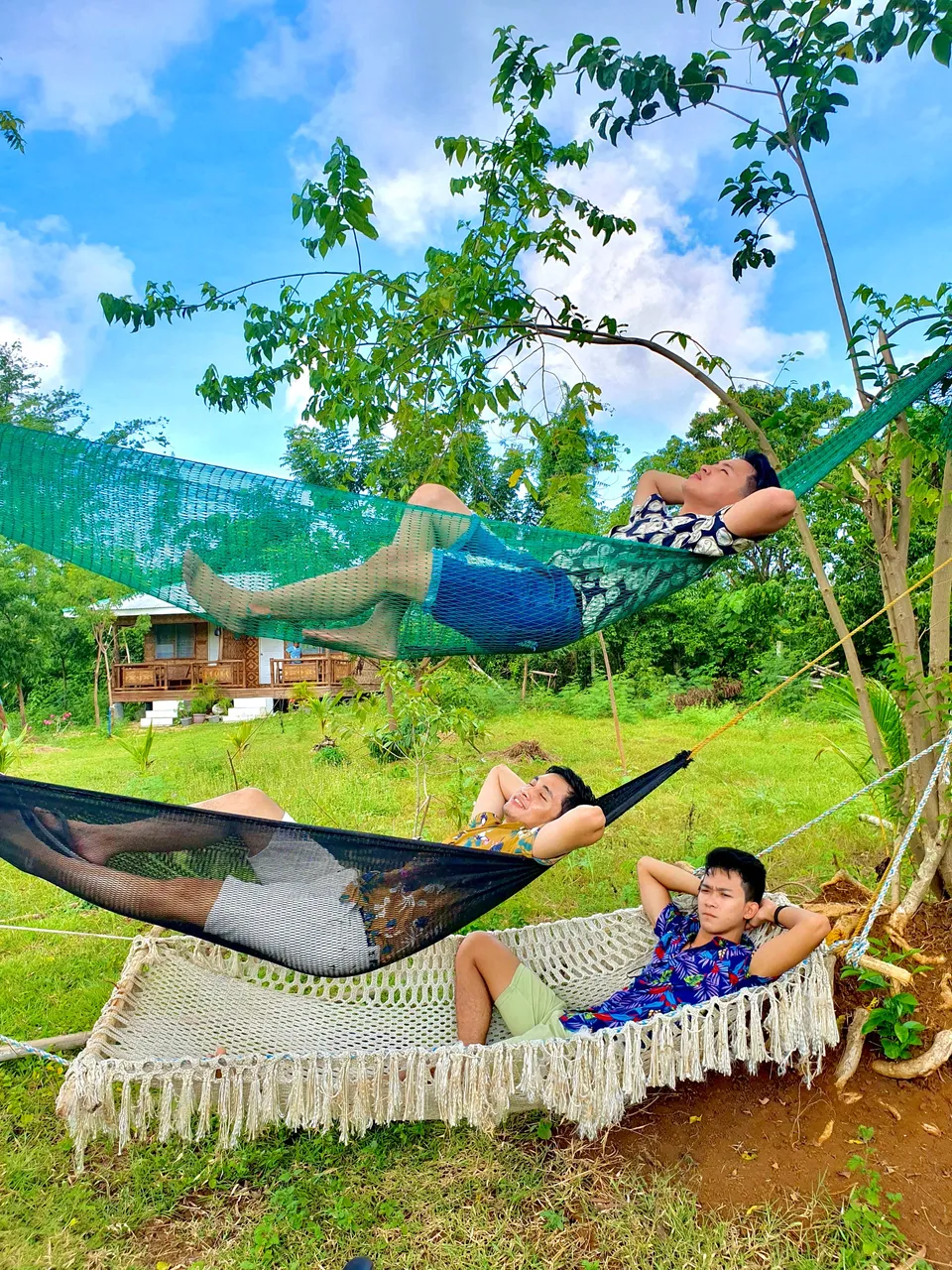 My boys and I chilling by the hammocks. Vibrant grass and vegetation encircled the entire villa.