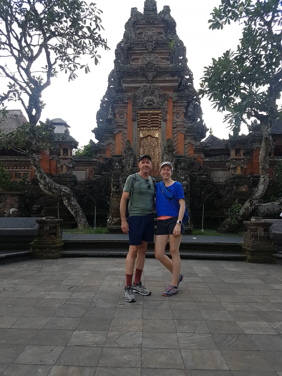 My partner and I inside the Saraswati Hindu Temple and Lotus Pond complex.