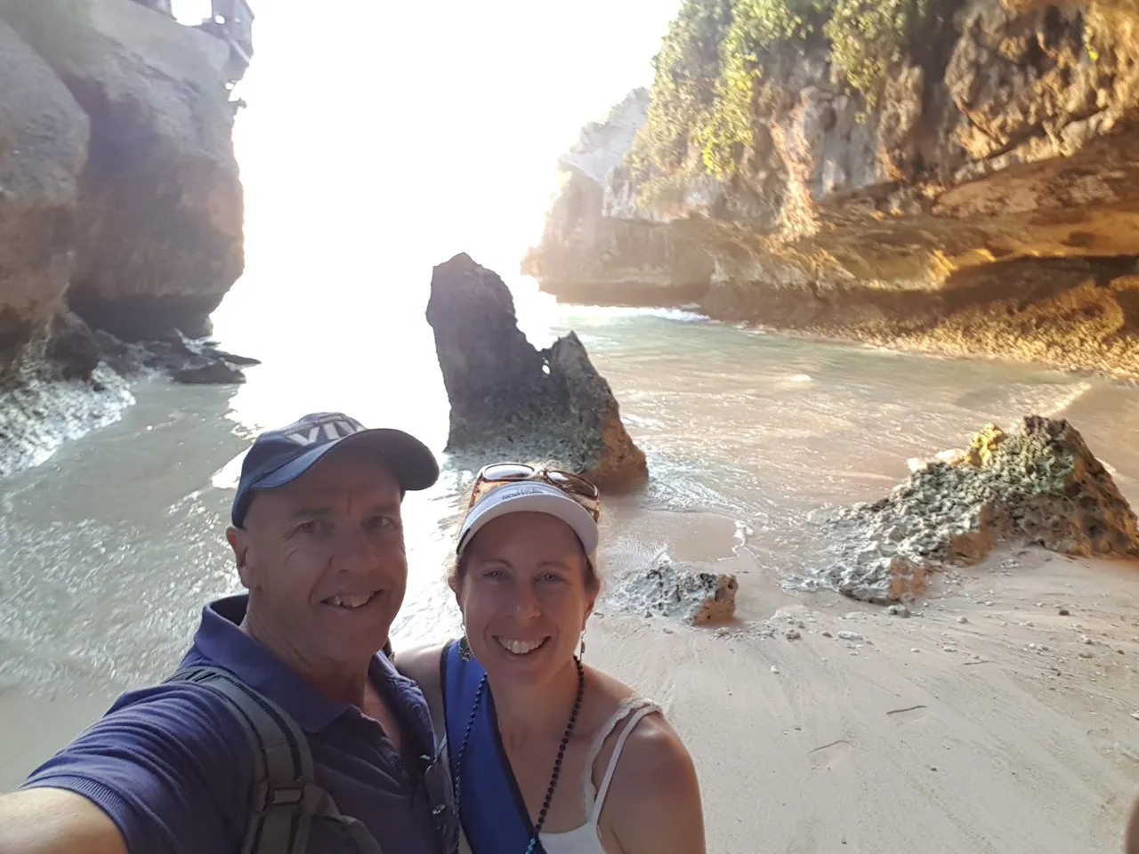 Suluban beach, one of the most unique beaches we’ve ever been to. We had to walk down a steep, rocky path and into a cave-like area to get to one part of the beach. The water would rise quickly with each wave and fill half the cave area, which caused a lot of our fellow visitors to squeal with surprise and run away from the water, only to repeat it all again moments later. There was a second part of the beach that was much wider, but we could only get there in low tide and it required squeezing through a hole in the rock. We stayed for an hour or so, had a swim and then left before the water made it unsafe to stay.