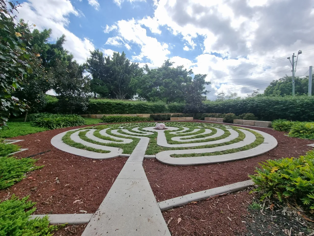 A Meditation Maze with a nice piece of rose quart crystal in the middle.