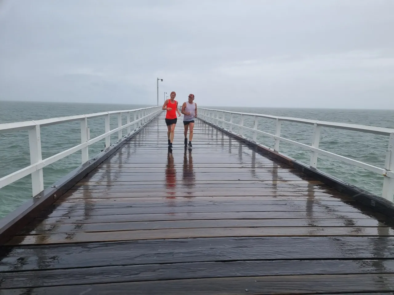 A cool down run for consciouscat with her new buddy Steve, on the 800m long Urangan pier on, what was, a very windy morning.