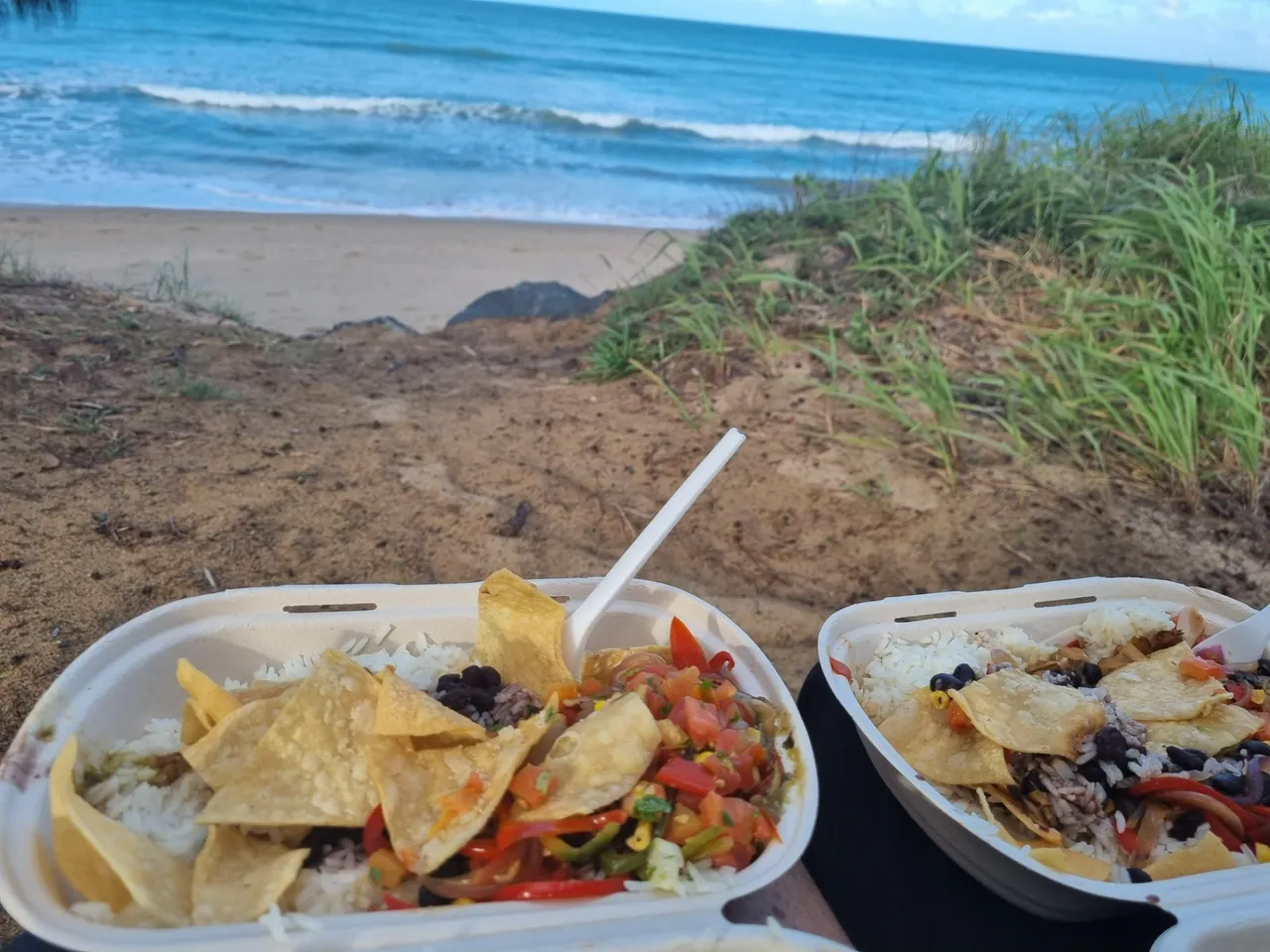 Early takeaway dinner from Guzman Y Gomez, eaten by the beach.