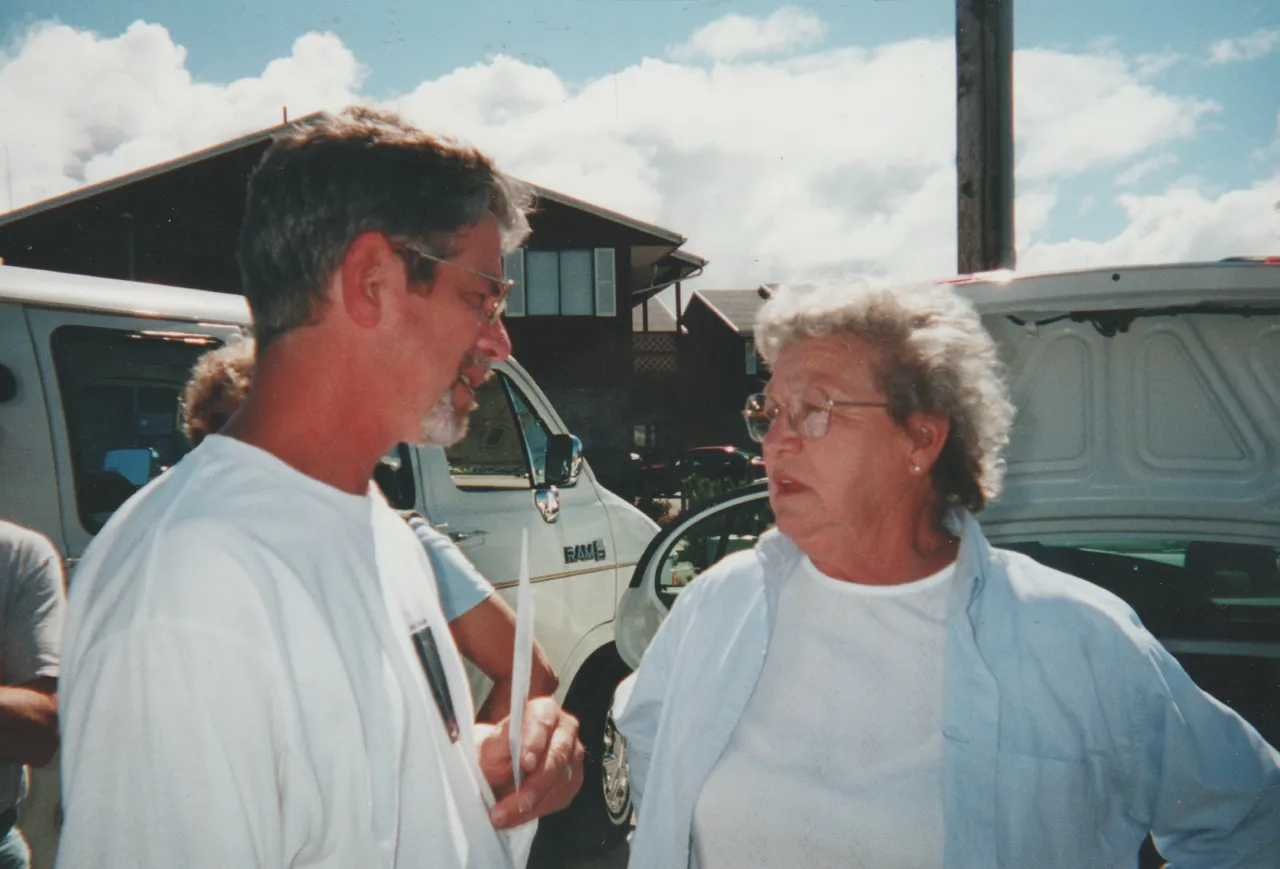 2000-07-24 apx - Reunion - gray hair man and glasses lady gray too 01.png