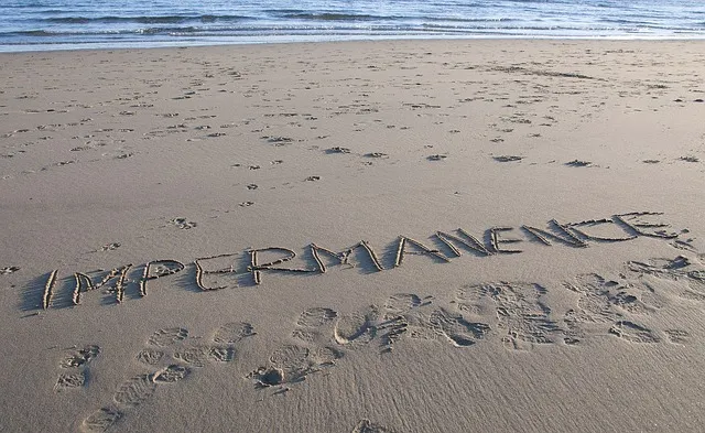 beach with impermanence written in sand.jpg