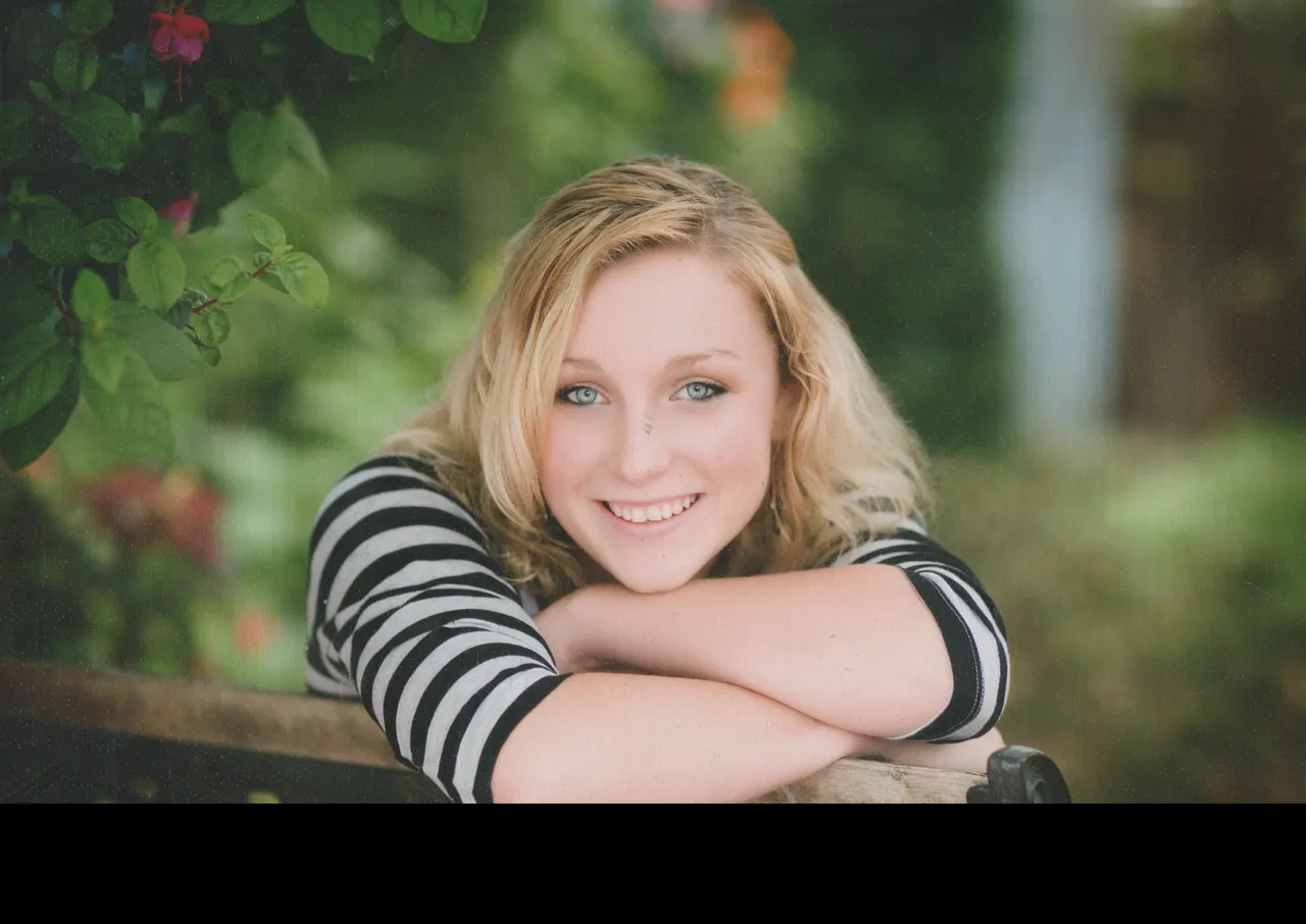 2006-09 - Crystal Arnold, age 16, grade 12, I assume taken in September but not sure, school pic, zebra shirt.png