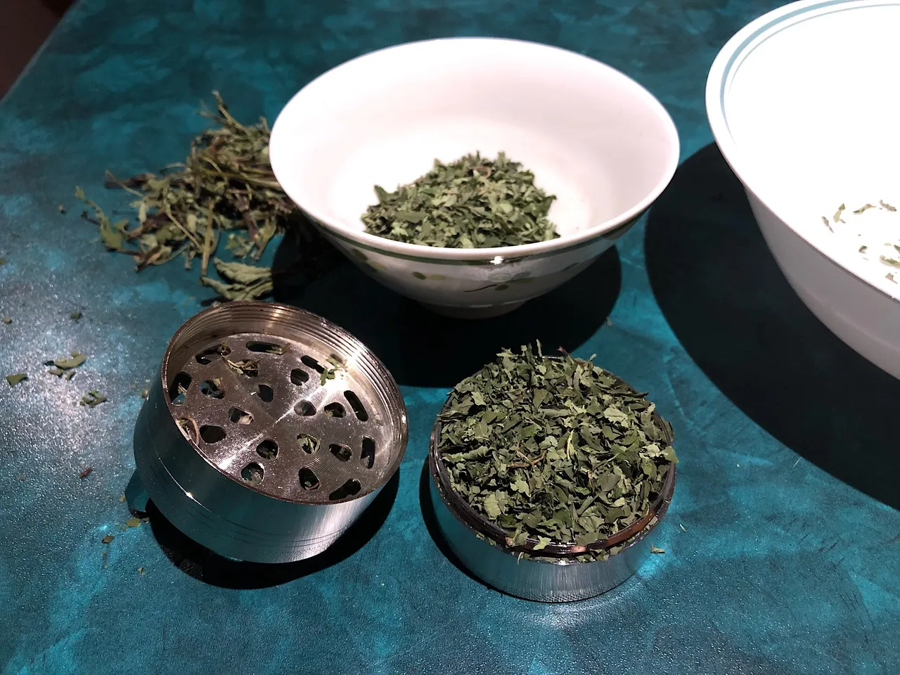 Chocolate Mint and Lemon Balm in a herb grinder