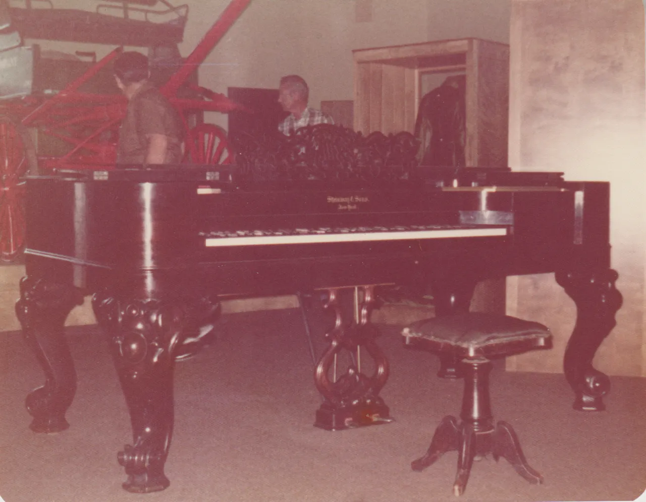 1975-07 - Random photos, man, lady, downtown somewhere, living room with piano, eagle, clock, house, car, no date, 7pics-4.png