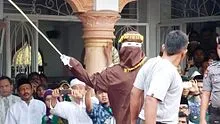 Aceh_caning_2014,_VOA.jpg