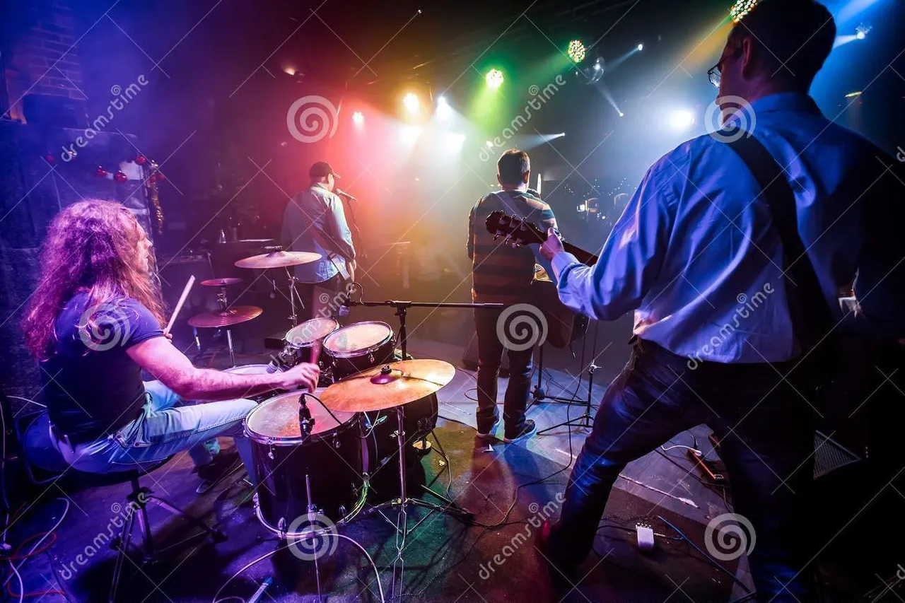 band_performs_stage_nightclub_band_performs_stage_rock_music_concert_nightclub_authentic_shooting_high_iso_125163201.jpg