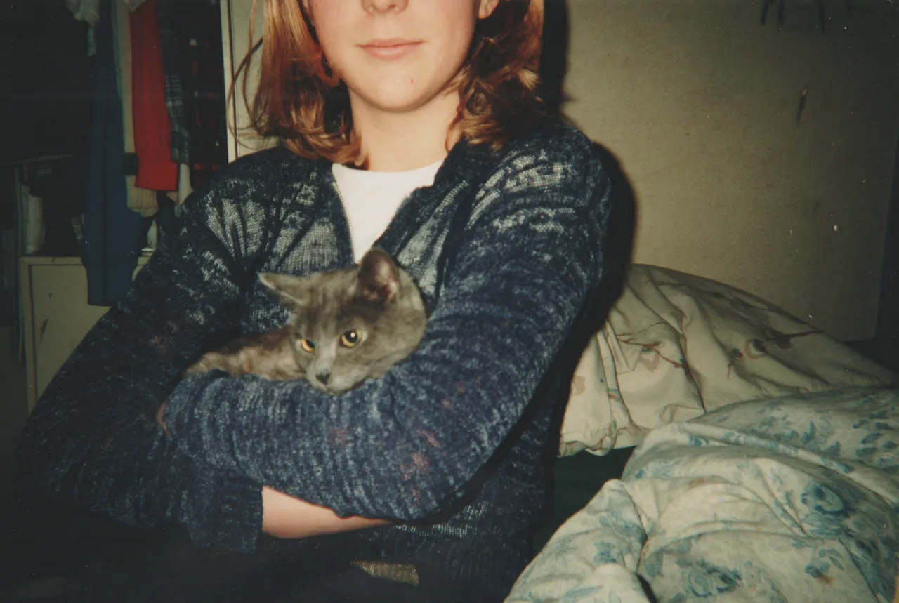 2001 Crystal Arnold & Puffer Junior Cat in Mom's Room.png