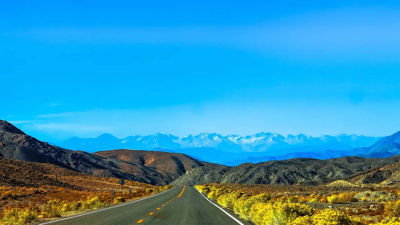 asphalt-blue-sky-clouds-490411.jpg