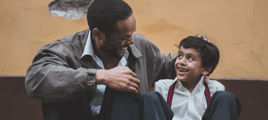 Man mentoring a child