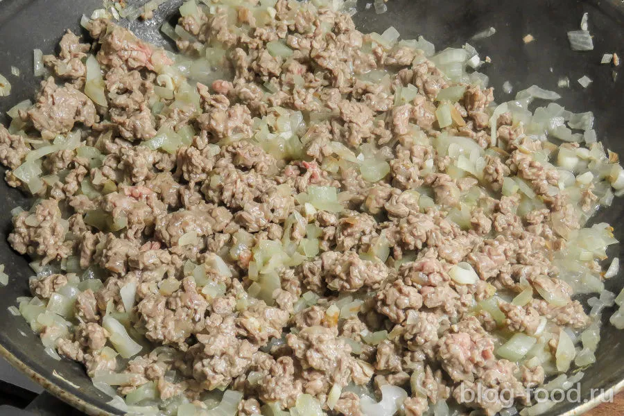 Potato casserole with meat, sour cream and cheese