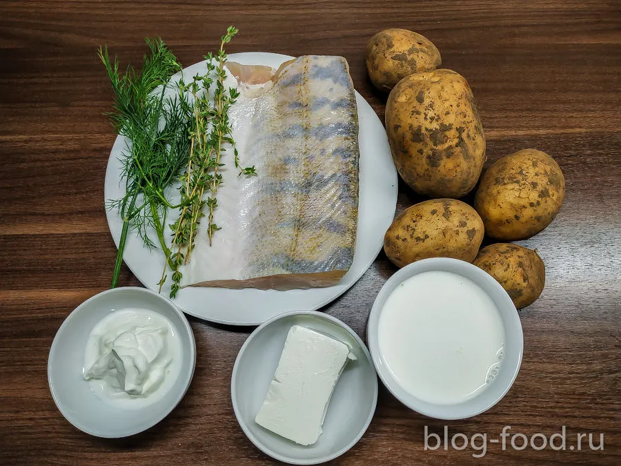 Pike perch with potatoes in cream sauce