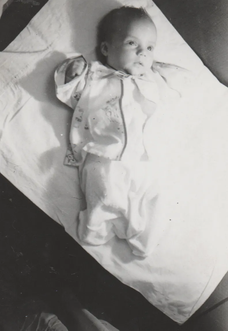 1960's maybe of a baby in black and white number on back J20553.png