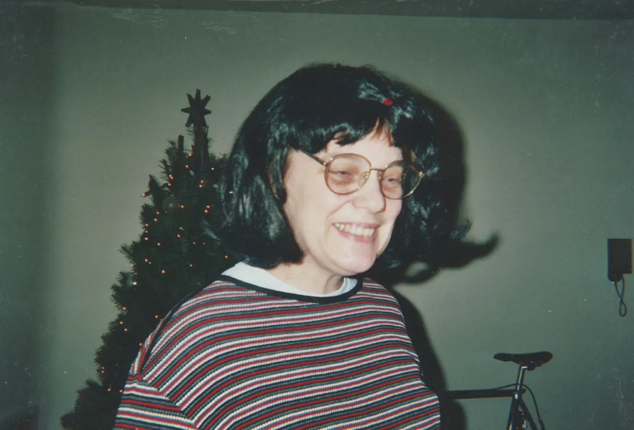 2004-12 - Marilyn in a black wig at our reunion in Portland, OR.jpg