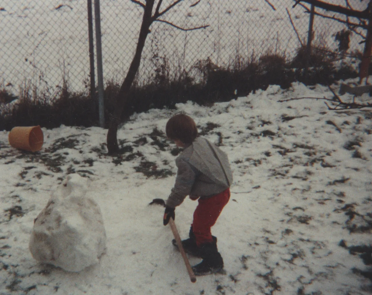 1991-02 - Joey building a snowman or something, might be early in 1991 or before like 1997, but no idea really which month or year-2.png