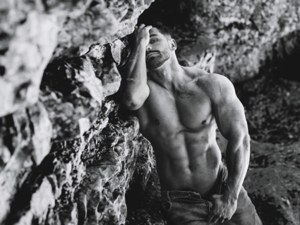 Muscled dude by rockface.jpg