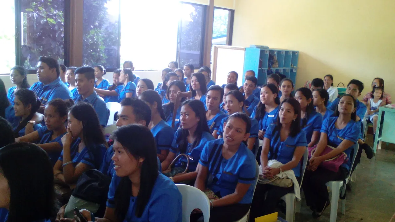 graduating students listening intently.jpg