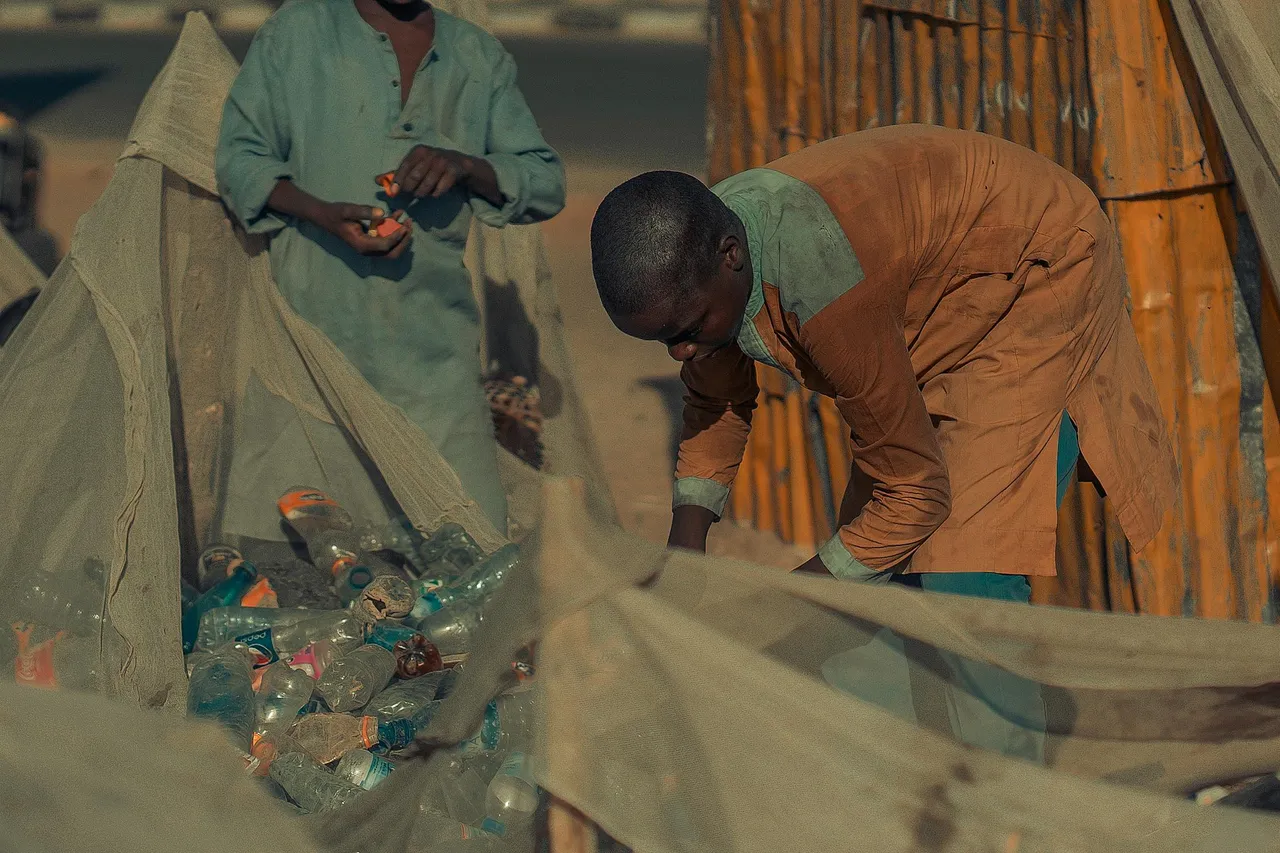 free-photo-of-people-putting-plastic-bottles-into-bags.jpeg