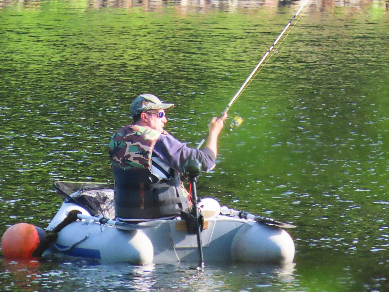 4894 Wed walk28 june  fisherman in boat.png
