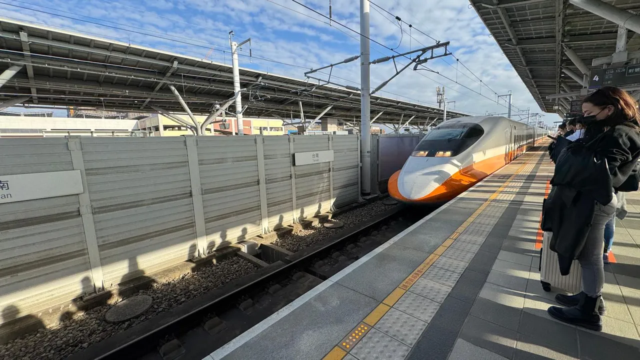 At The Platform As Train Arrives