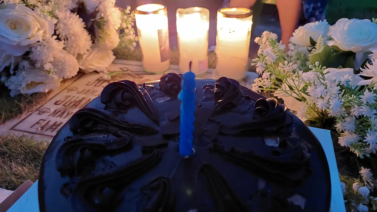 Visiting our Grandfather's grave on his Birthday